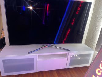 Beautiful White perfect condition entertainment center for TV drawer and two cabinets