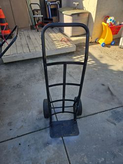 Sturdy construction  hard rubber tires  dolly