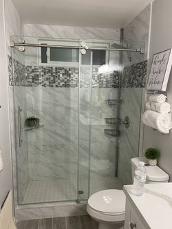 Sliding shower door glass
