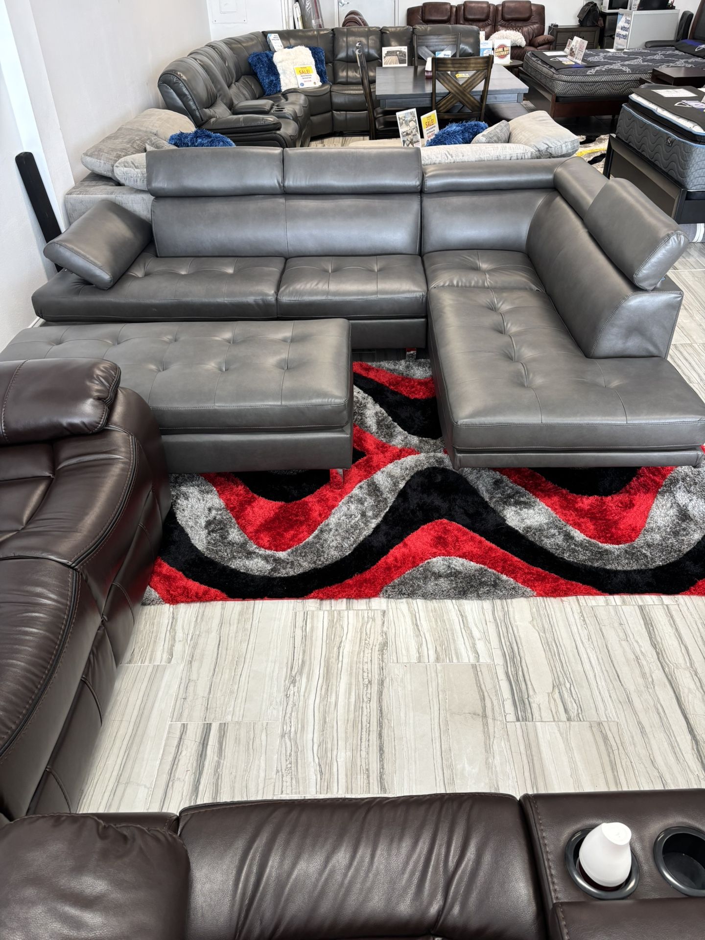Spring Blowout Sale. Ibiza Gray Sectional With Ottoman Only $799. Easy Finance Option. Same-Day Delivery.