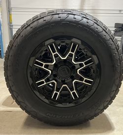 Level 8 wheels with Nitto Terra Grapplers (Set of 4)