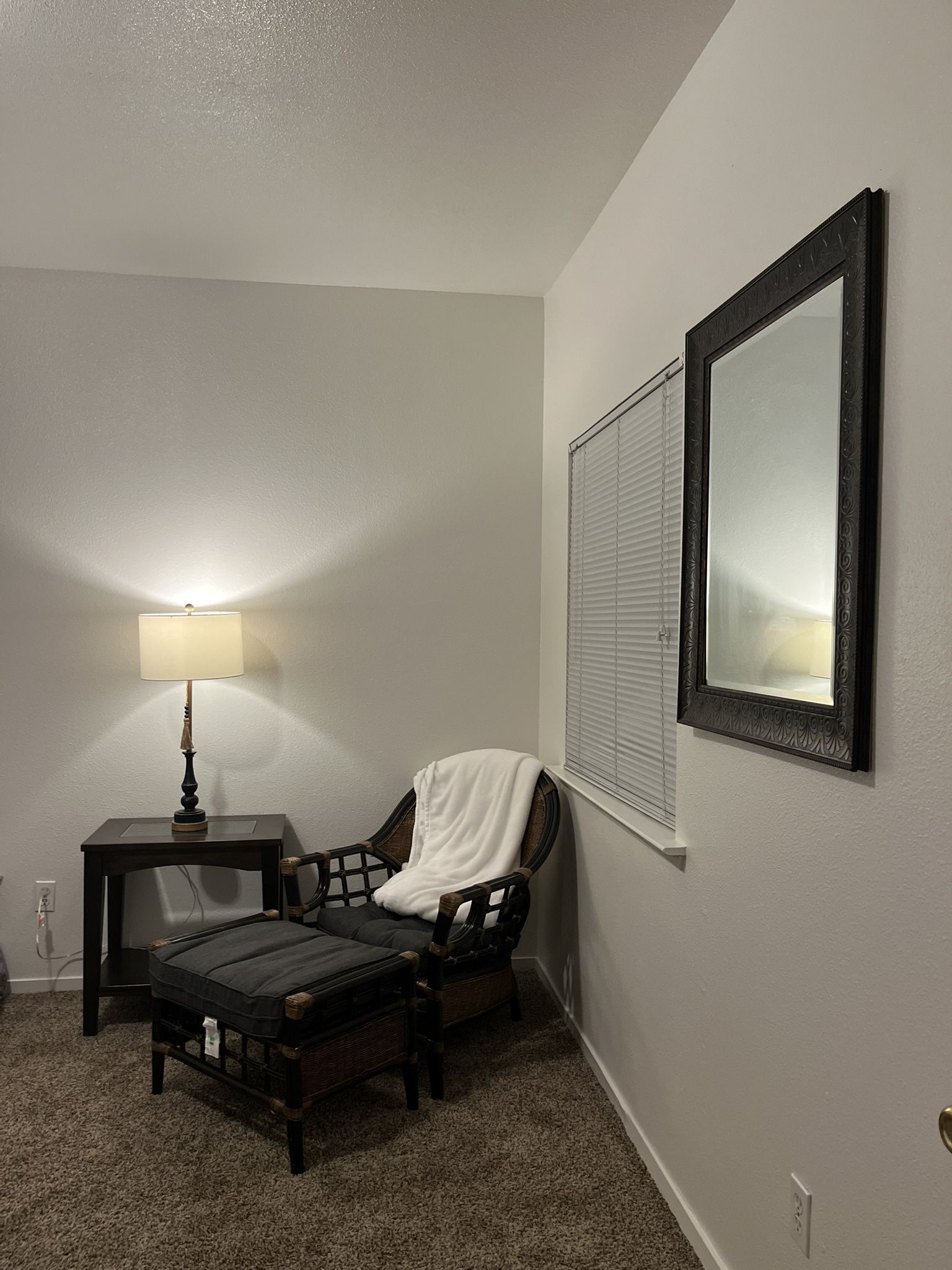 Wicker chair with ottoman & lamp