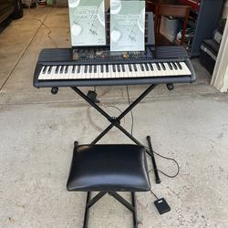 Yamaha PSR 195 portable keyboard with power supply bench & foot pedal.
