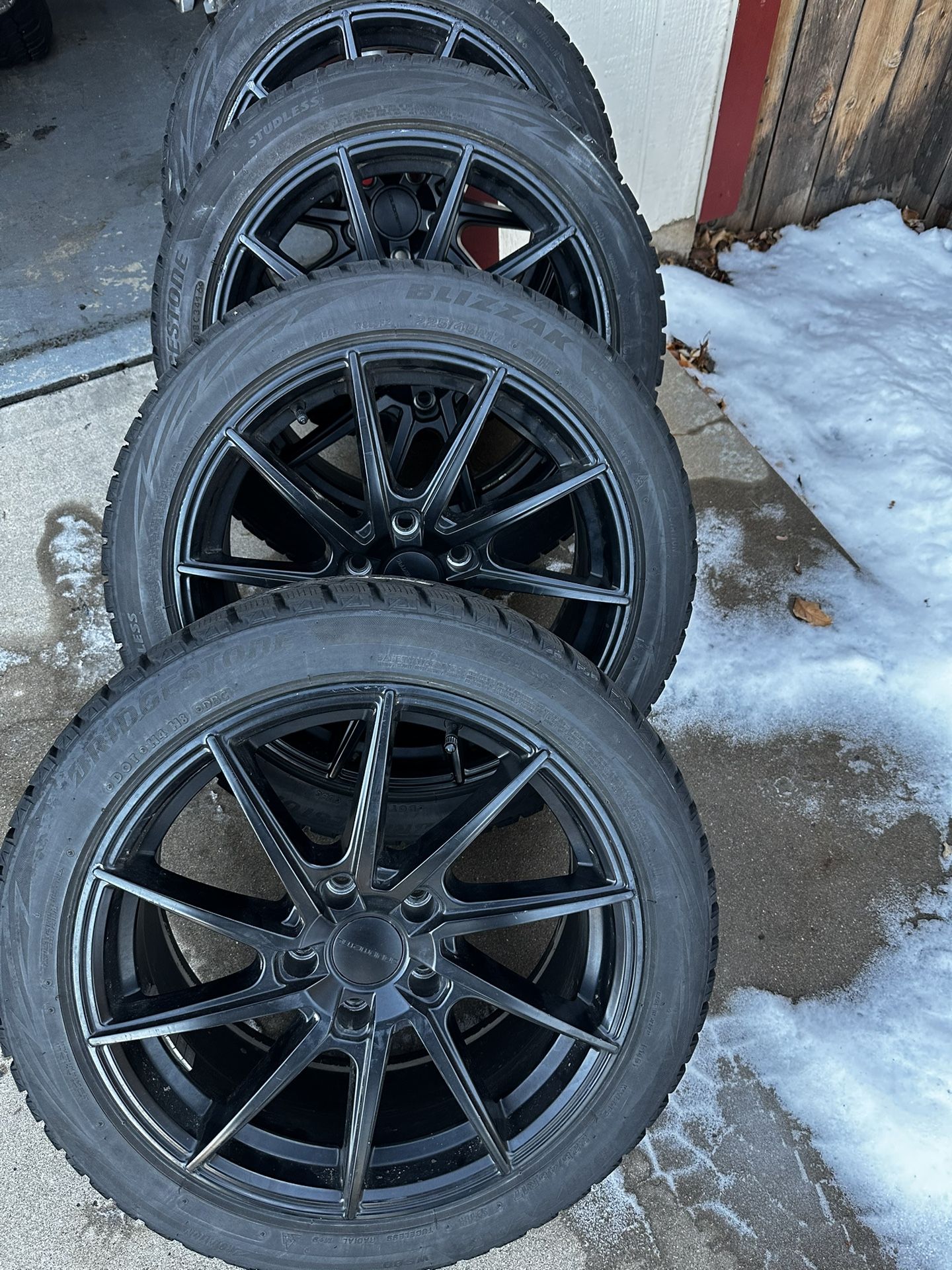 225/45/17 Blizzak Tires Mounted on 5x114.3 Liquid Metal Blackout Rims