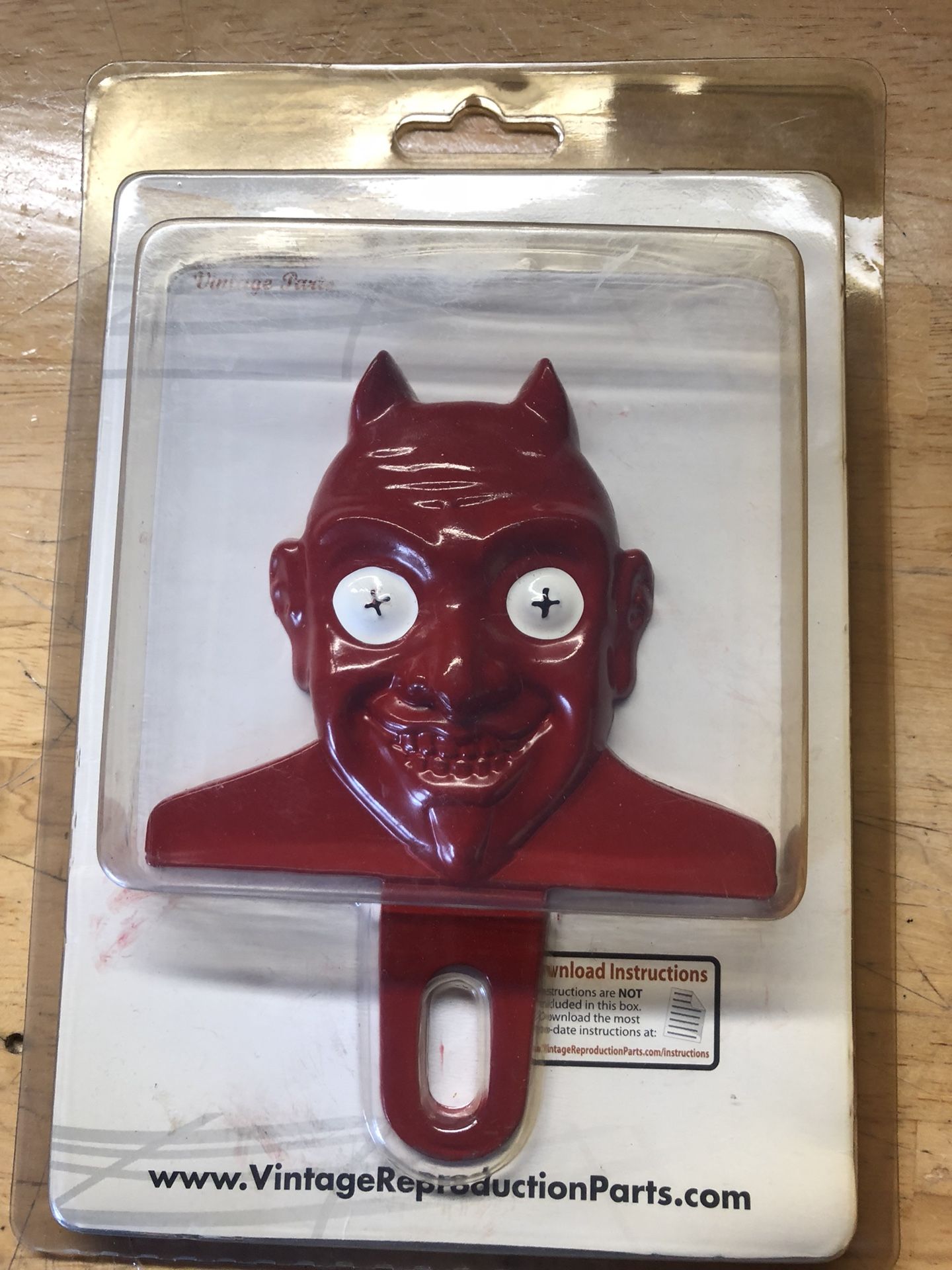 Vintage license plate topper devil