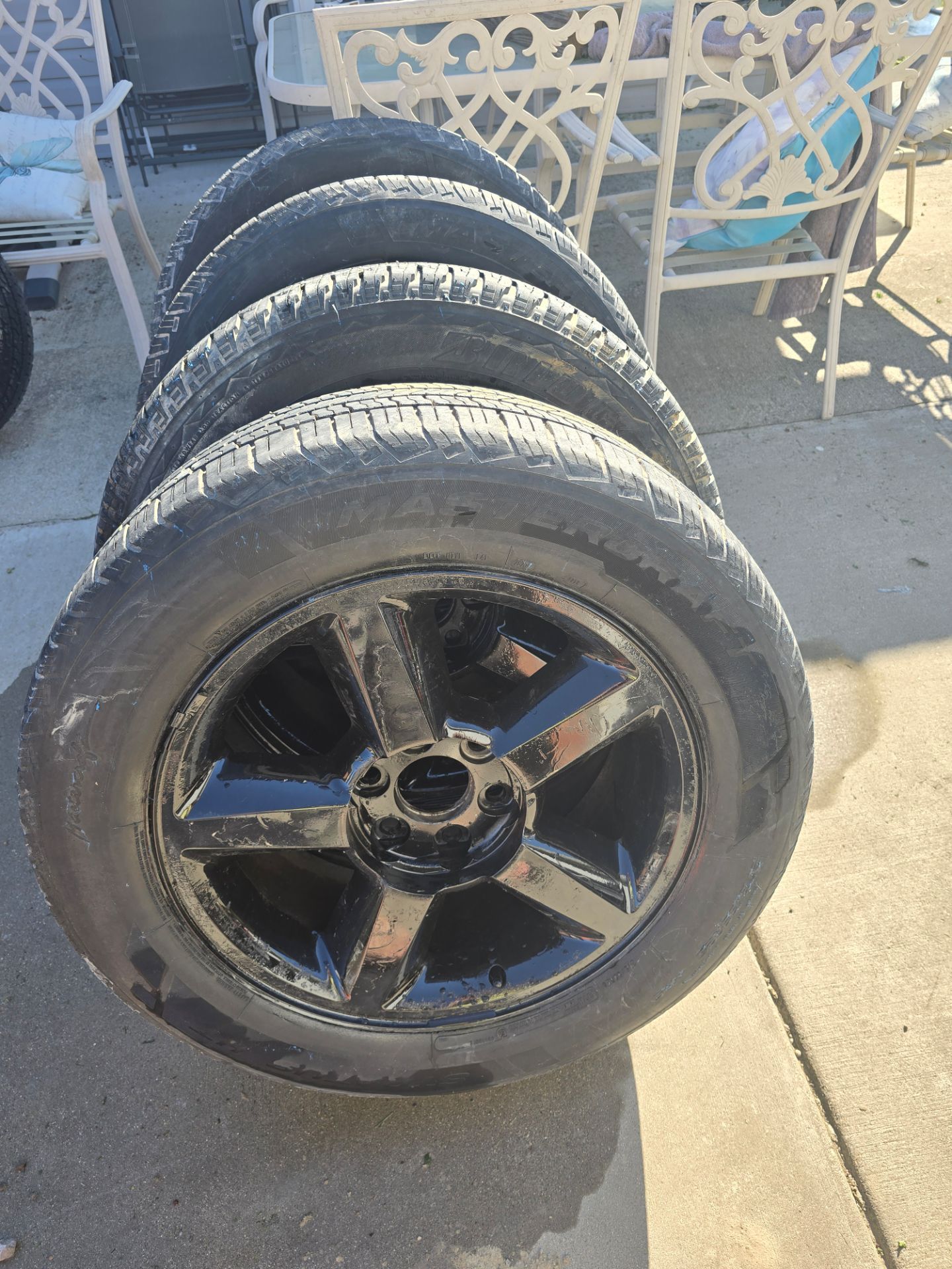 Four tires for sale—suitable for Chevy Silverado, Tahoe, GMC, and Suburban—size 275/55/20.