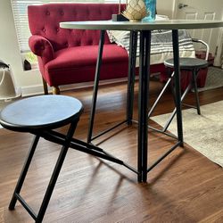 Small Table/built In Chairs 