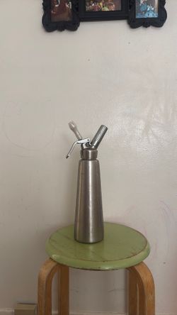 Whipped cream dispenser