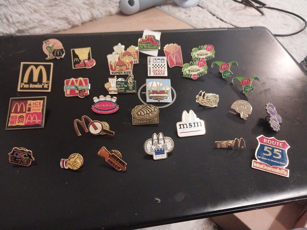 A Bunch Of McDonalds Flare Pins