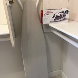 Brand new ironing board and iron still in the box!