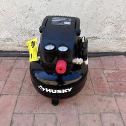 Husky  3 Gal. 120 PSI Portable Electric Oil-Free Light Duty Pancake Air Compressor with Fold Down Handle and 1-Quick Coupler