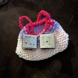 Metal Dice And Knitted Bag