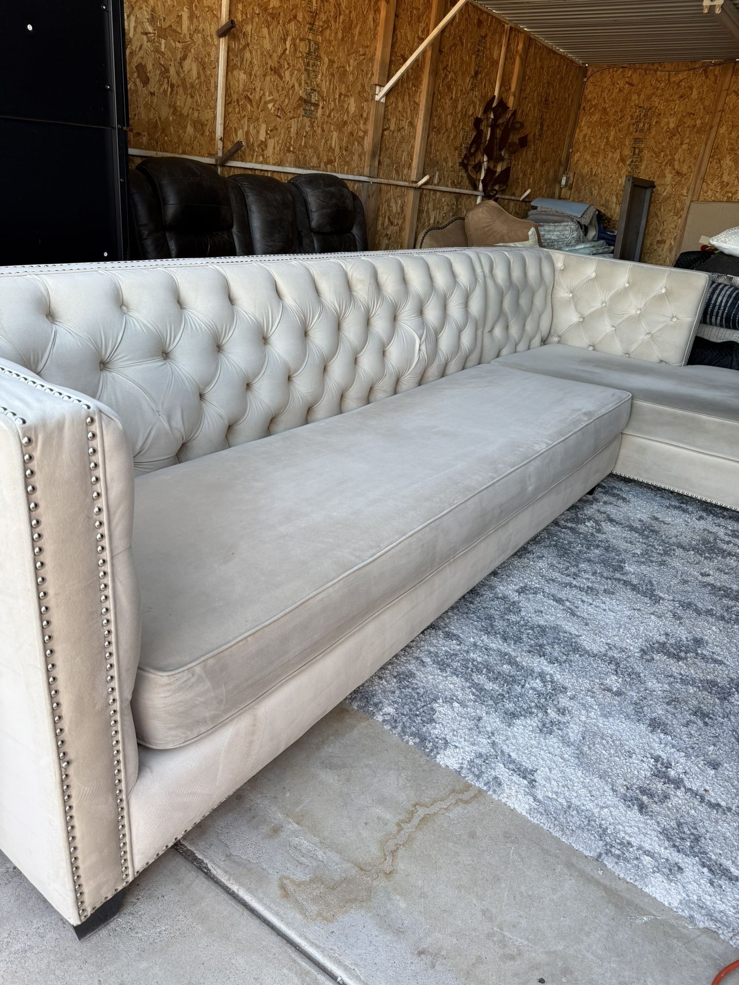 tufted, L-shaped sectional sofa with a chaise lounge. *champagne color*