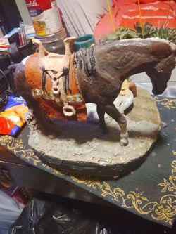 Vintage native American with the artist signature on  it's 10 to 15 pounds it's heavy in great condition