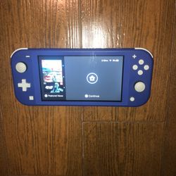 Nintendo Switch lite, with case and game