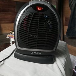 Pelonis Programmable Rotating 1500W Fan Forced With Hi ,Med,Low&Fan Settings Adjustable Thermostat Shut Off Safety Features @25obo