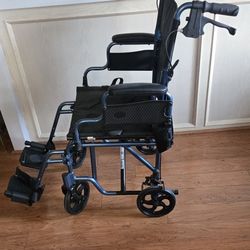 Nova Transport Wheelchair With Foot Rests And Hand Brakes 