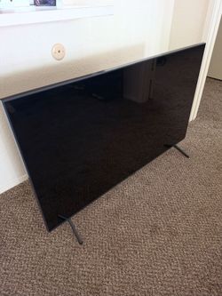 Large Flat Screen TV with Stand