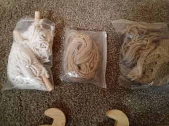 Large macrame bundle with hanging equipment
