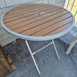 HEAVY DUTY FOLDING PATIO TABLE.