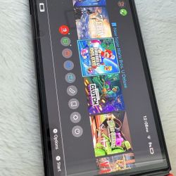 Nintendo Switch with Neon Blue and Neon Red Joy Con