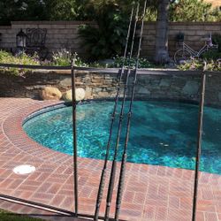 THREE (3) GRAFTECH 8’0” saltwater, conventional fishing rods.