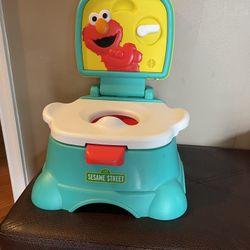 Sesame Street - Elmo Hooray! 3-in-1 Potty, Toilet Trainer, Potty Chair and Step Stool for Boys & Girls - Blue