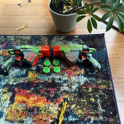 Two Nerf Proton Blasters + 4 Discs