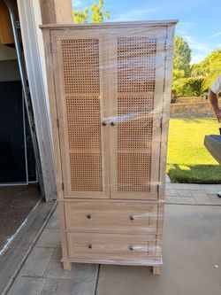 Natural wood cane armoire with drawers