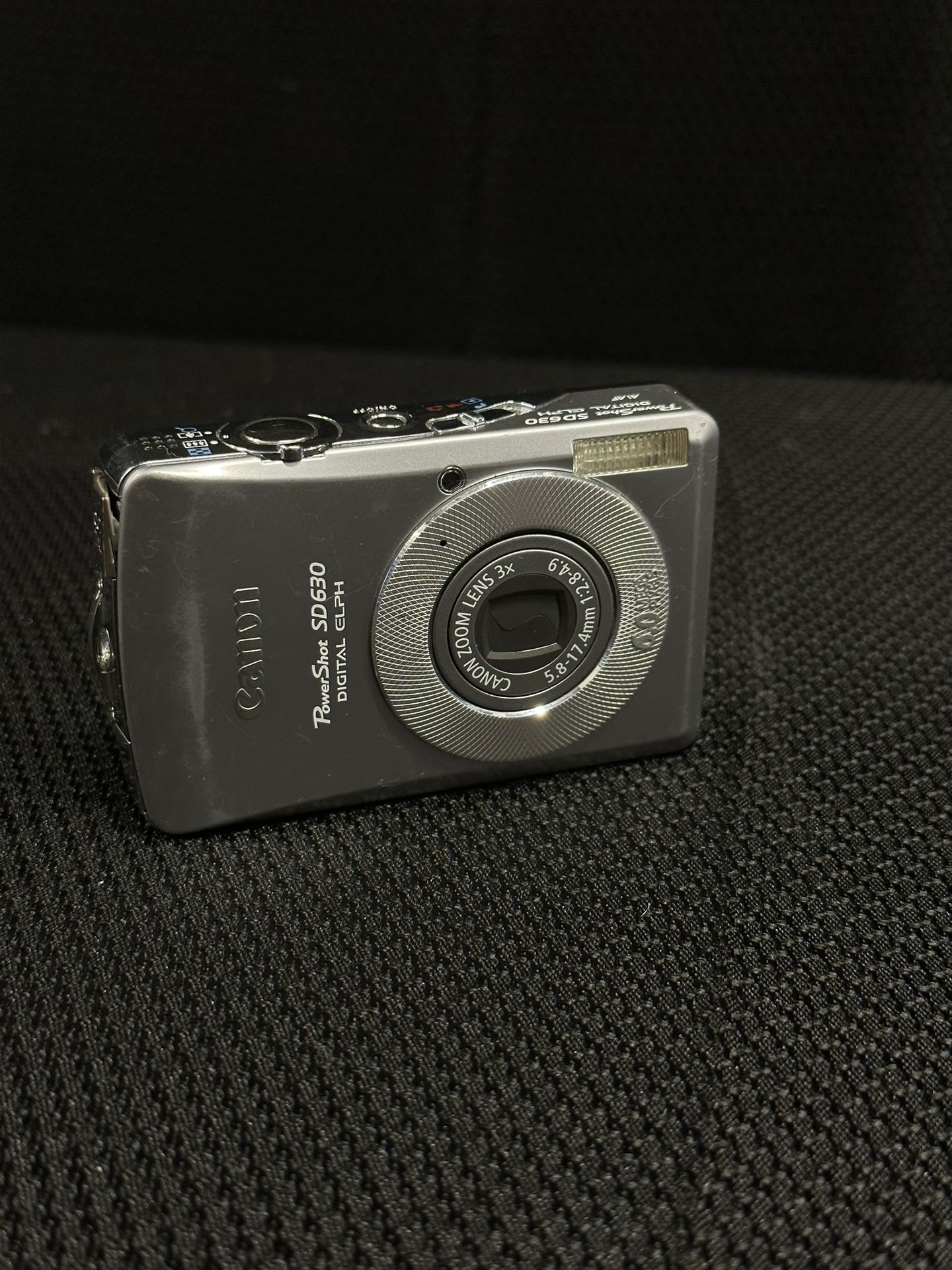 Canon PowerShot ELPH SD630 / IXUS 65 6.0MP Digital Camera - Silver With Battery.