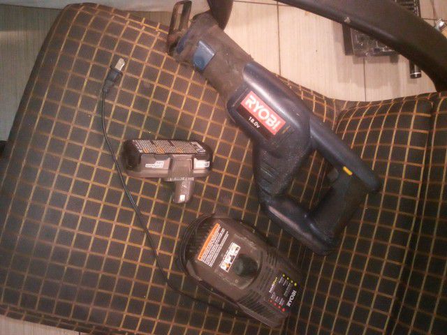 Ryobi Saw with battery And Charger 
