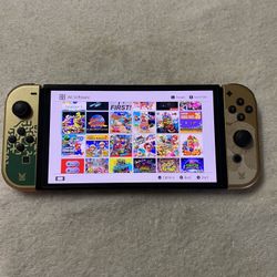 SWITCH OLED and 125 SWITCH GAMES 
