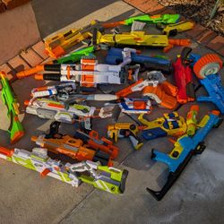 Huge Lot Of Nerf Guns And Accessories