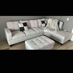 New White Grey Sectional And Ottoman