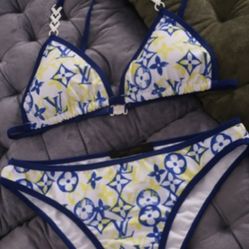 LV BATHING SUIT SIZE SMALL AND MED