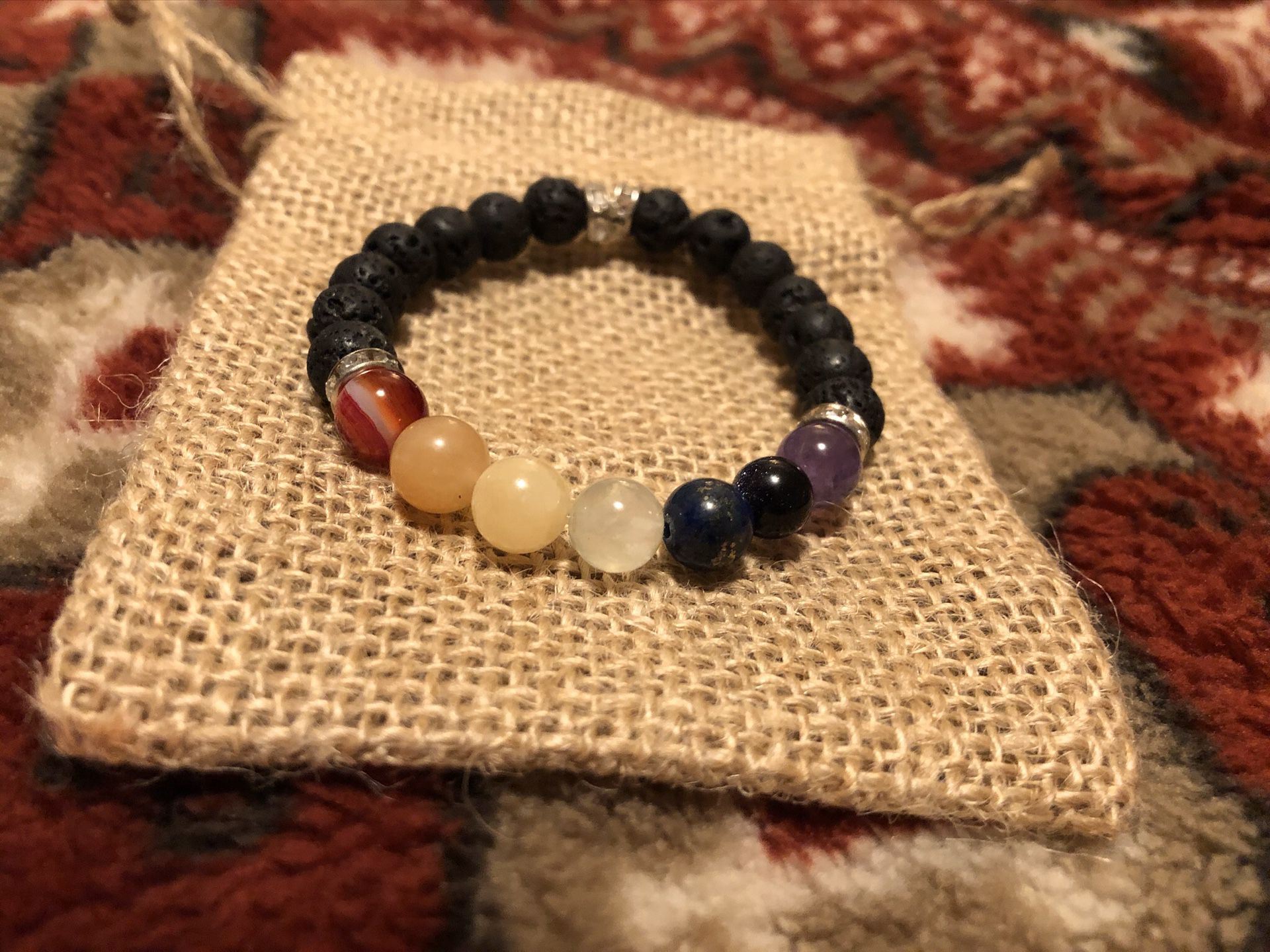 Brand new! Chakra bracelet with lava beads