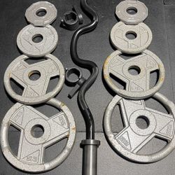 HEAVY DUTY OLYMPIC CURLBAR AND WEIGHTS