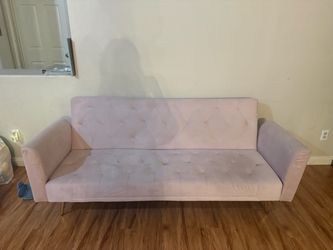 A cute pink sofa bed couch 40