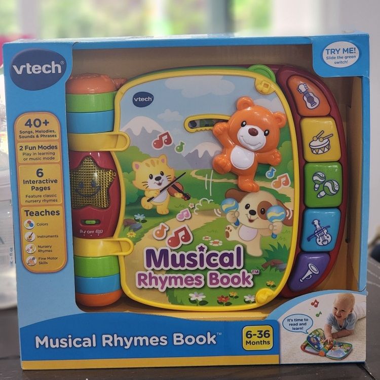 VTECH MUSICAL RHYMES BOOK