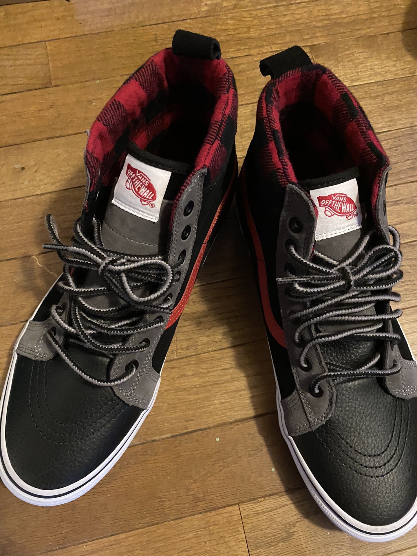 High top Vans Size 10.5 Worn one time.