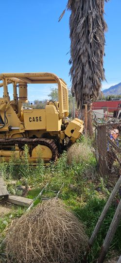 Case dozer, 1985 toyota truck,1979 m.g.b. car, bread truck panel van.
