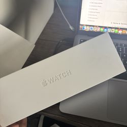 Brand New! Apple Watch Series 11 GPS + Cellular, 42 mm Titanium Case w/ Black Sport Band - S/M