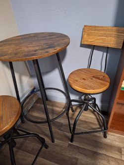 New 30 inch Bistro table and swivel chairs