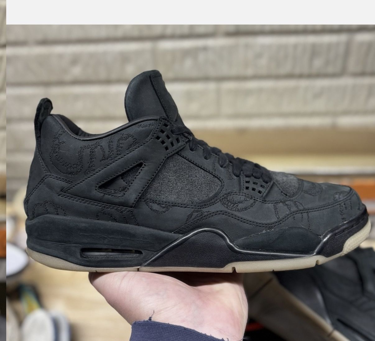 Size 12 - Jordan 4 Retro x KAWS Black 2017