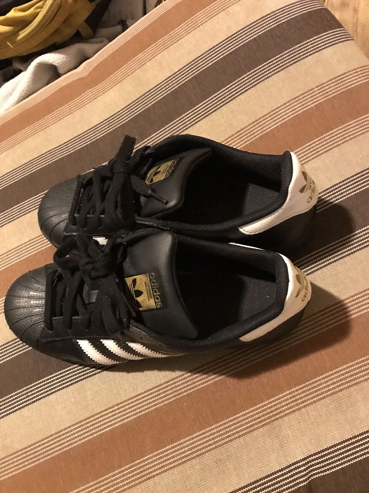 Black Adidas shell toes