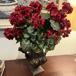 Decorative red flower arrangement And Beautiful Metal Vase