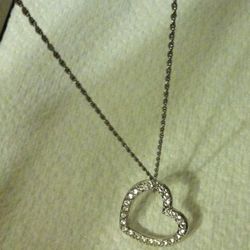 Swarovski Silver Tone Clear Rhinestone Open Heart Side Hanging Pendant Necklace.