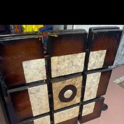 Two piece of wall art composed of multiple square panels . Made of wood and metal 29"x29" $29 each 