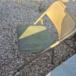 Metal Folding Chair With Green Seat Padding