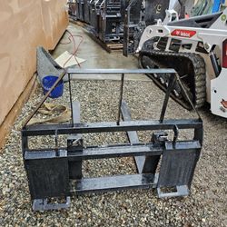 Skid steer pallet forks.